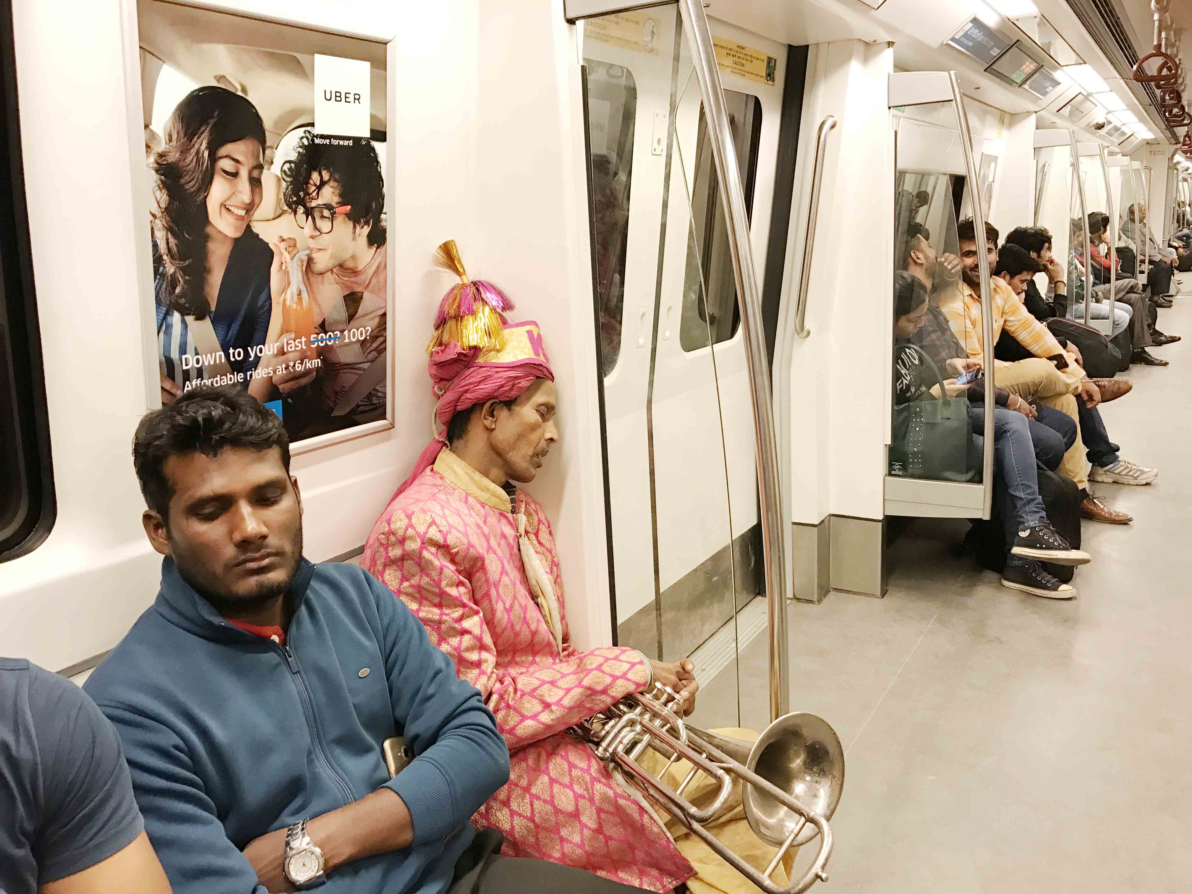 City Moment – The Overworked Music Men of the Yellow Line, Rajiv Chowk  Metro Station – The Delhi Walla