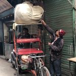 City Moment - A Rickshaw Puller's Business Negotiations, Central Delhi